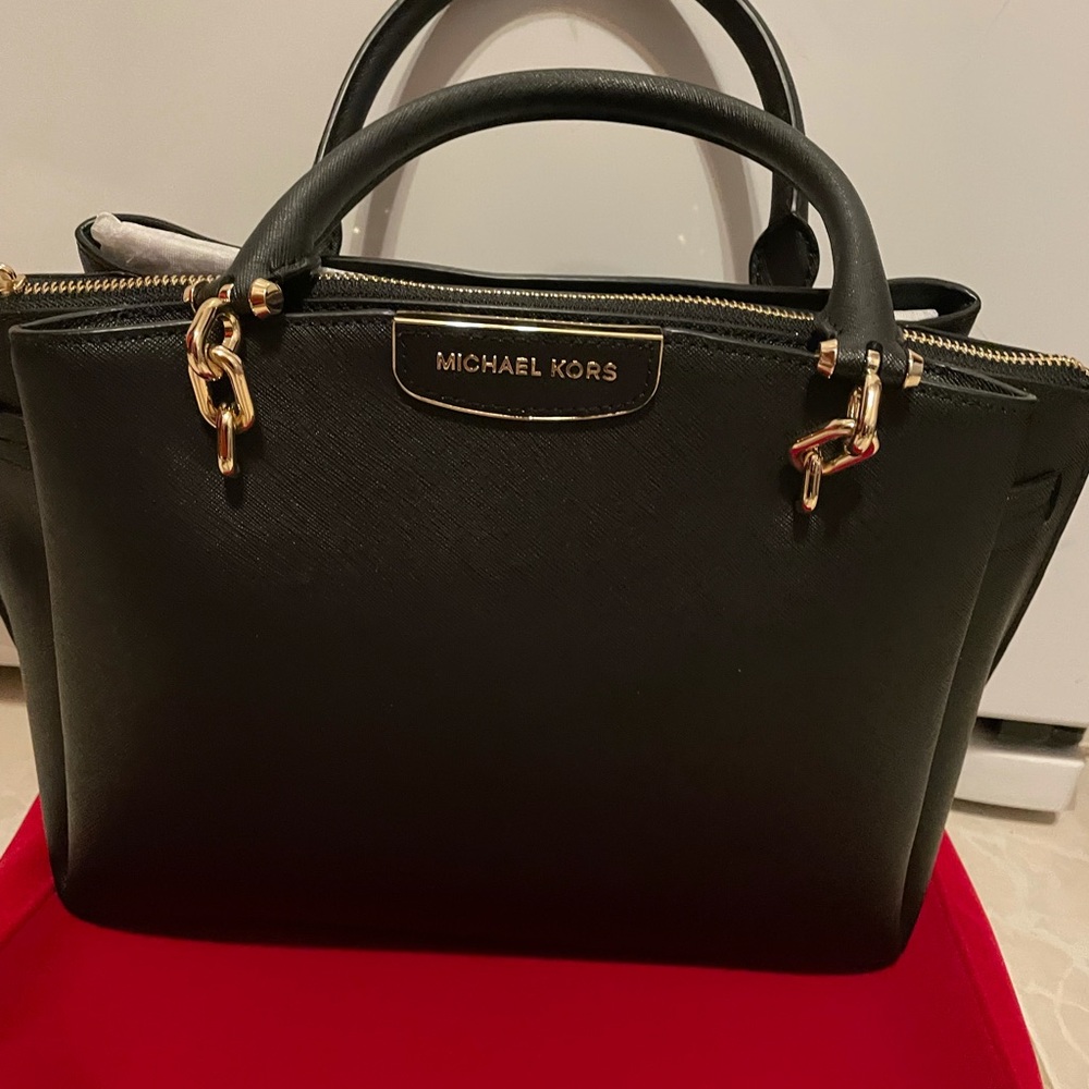 Brand new leather Michael Kors satchel.